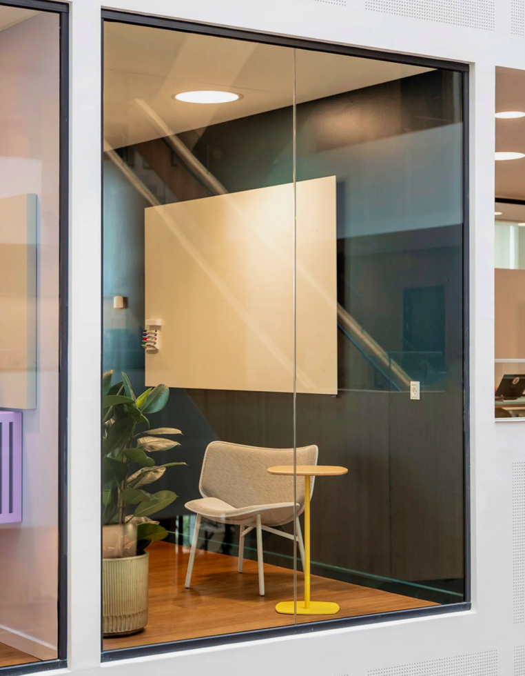 Meeting room behind glazed partition