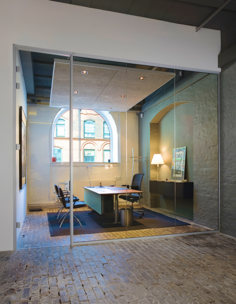 Workspace with glazed meeting rooms
